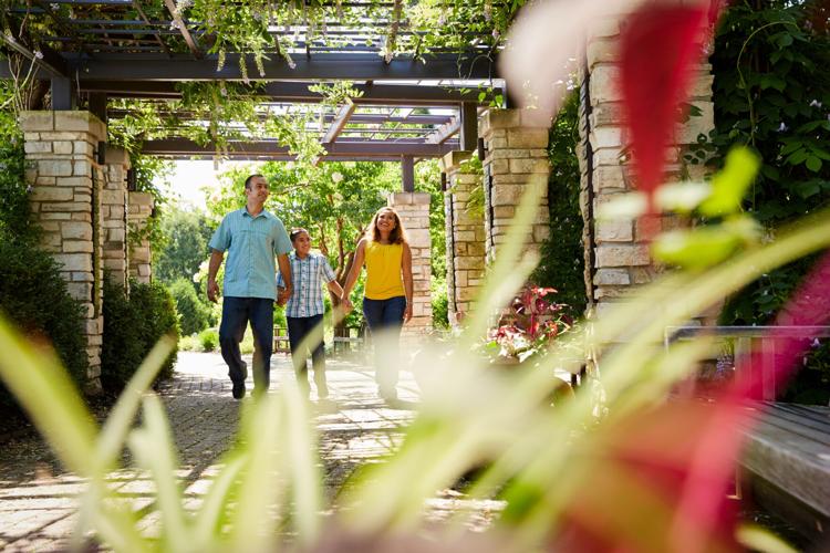 Family Walking through the Olbrich Donor Arbor.jpg
